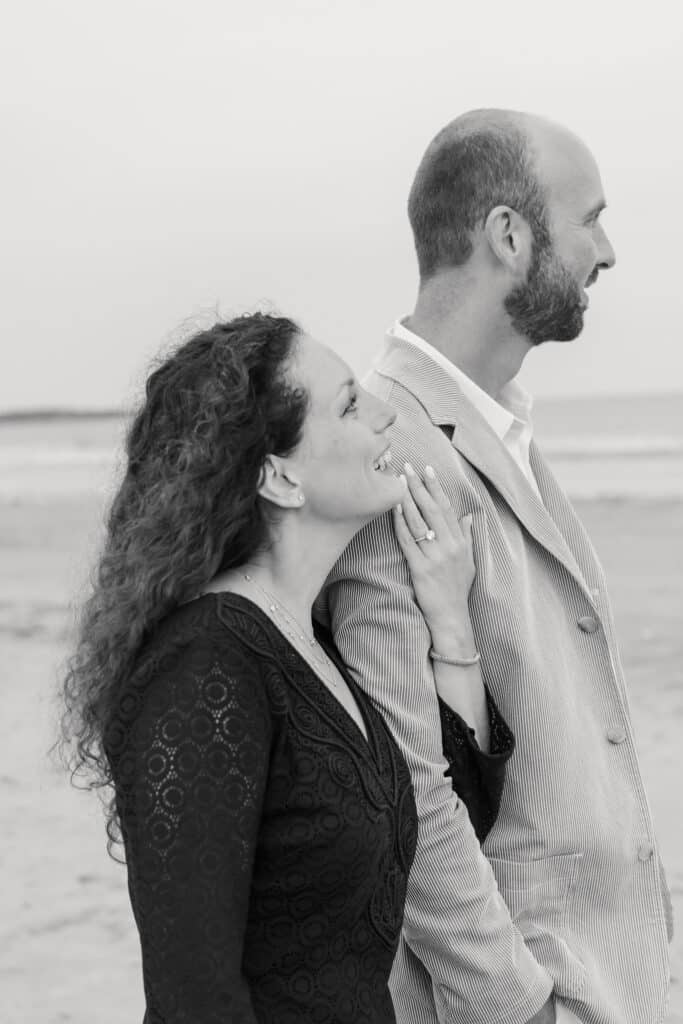 couple walks on second beach in newport