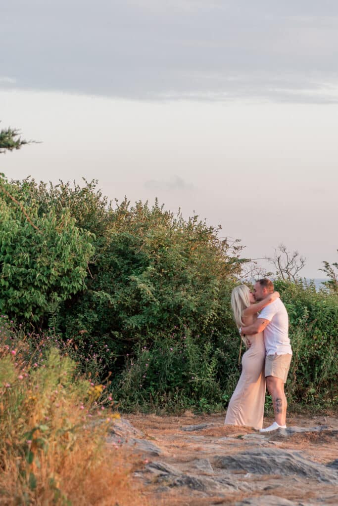 couple kisses after proposal