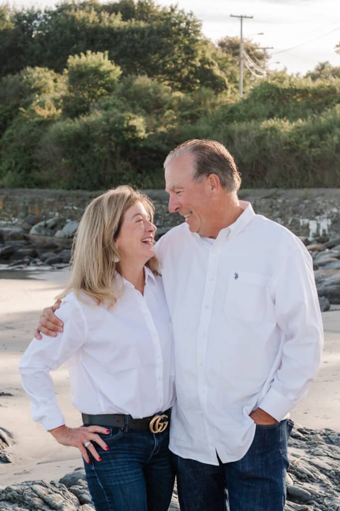 grandparents smile at each other