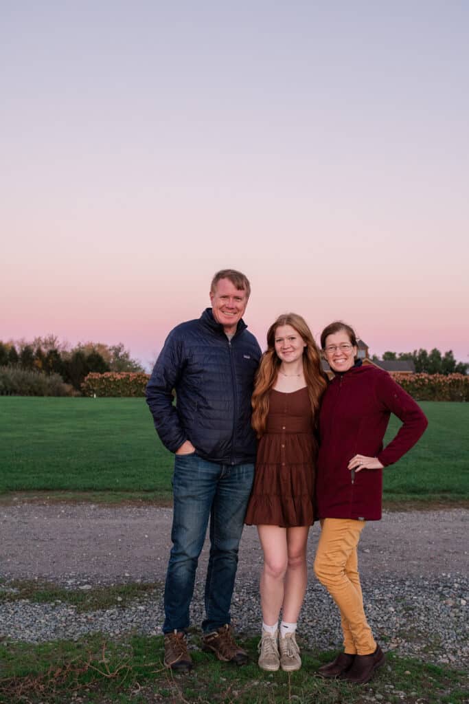 family poses at sweet berry farm