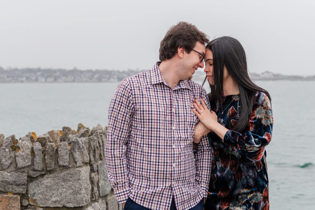 couple stands near forty steps on cliff walk