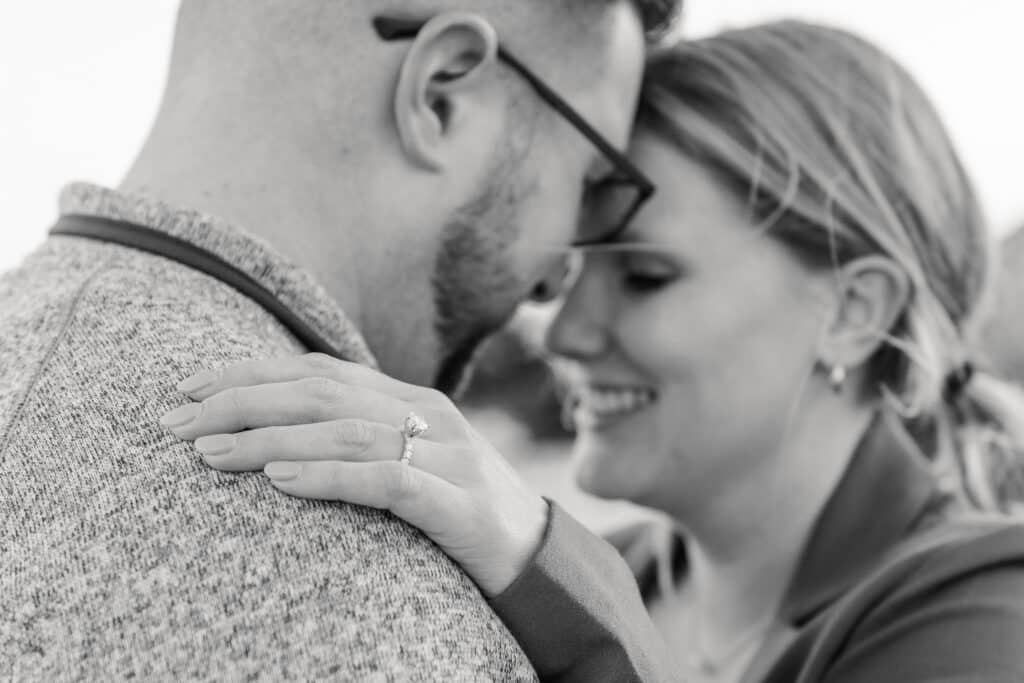 couple smiles after newport engagement