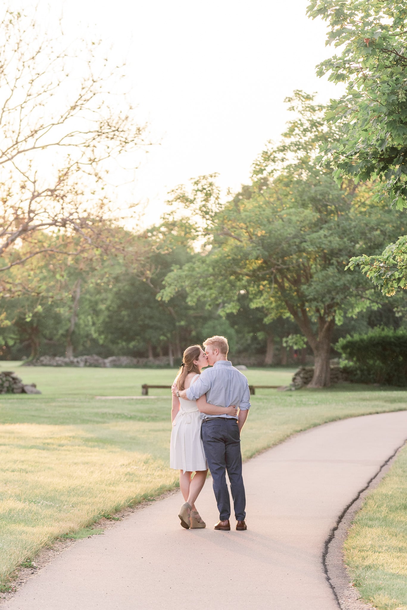 couple kisses at colt state park bristol for newport ri engagement phtoographer