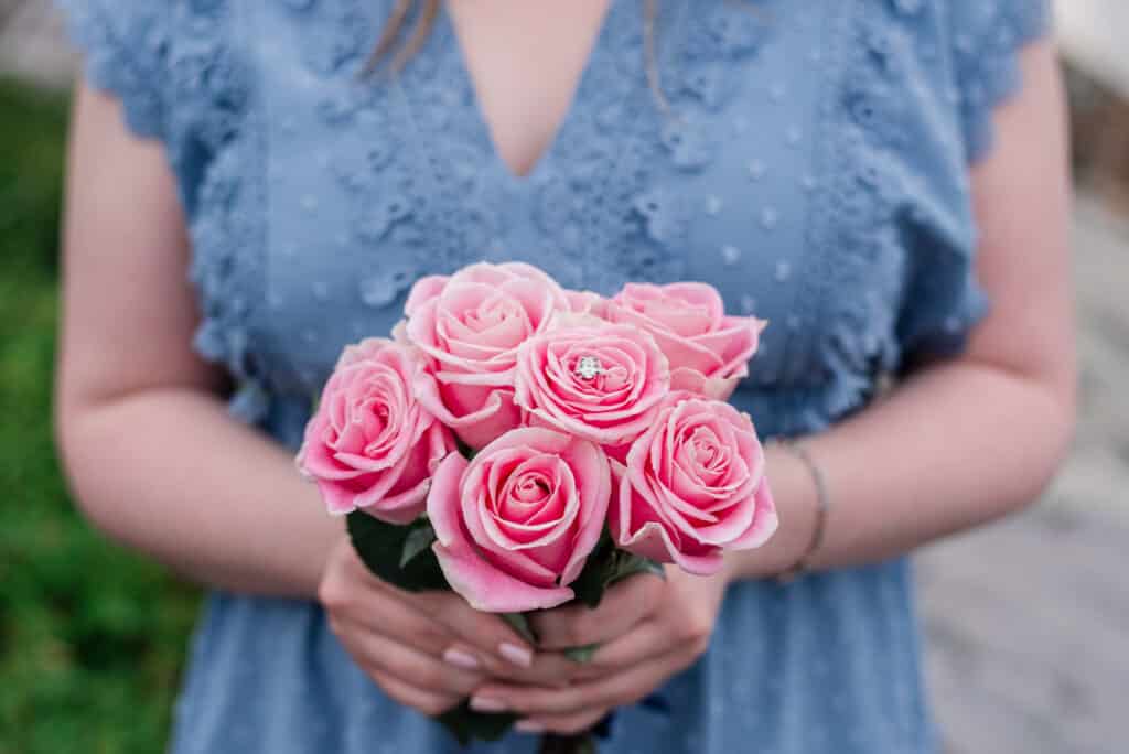 engagement ring in rose bouquet