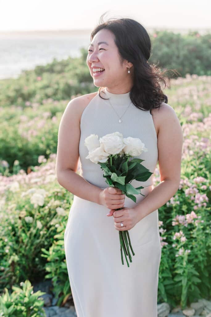 girl smiles after brenton point engagement