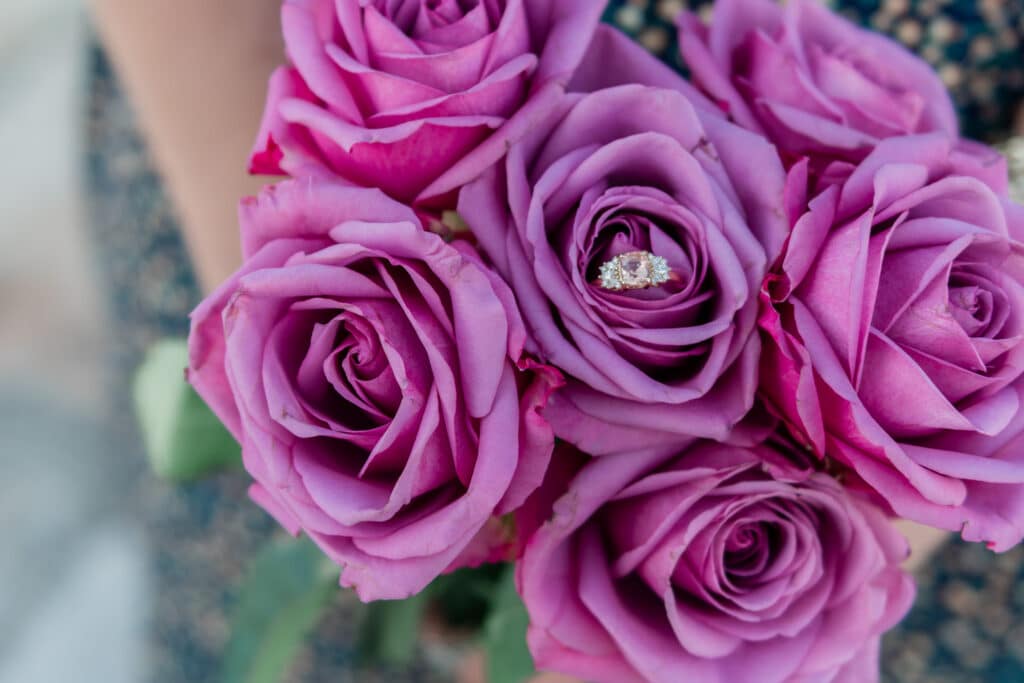 pink roses and peach sapphire engagement ring