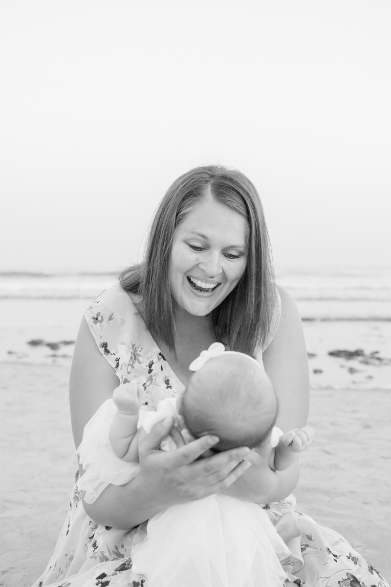 ri newborn photographer photographs newborn on beach